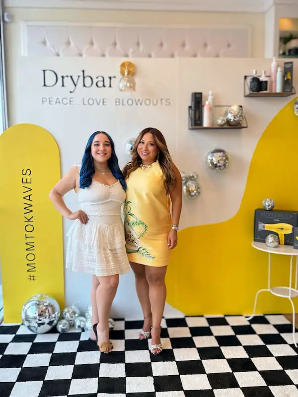 two moms at drybar event