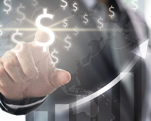 Graphic of a buiness person pressing a dollar sign with a upward trending chart symbolizing growth through leveraging capital for a beauty and wellness franchise